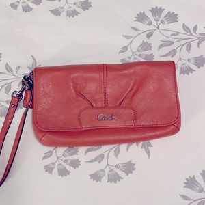 Coach coral/peach leather wristlet w/ silver